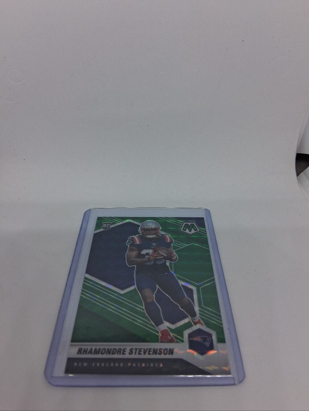 2021 Panini Mosaic - Rookies Rhamondre Stevenson #337 Green Mosaic Prizm (RC)